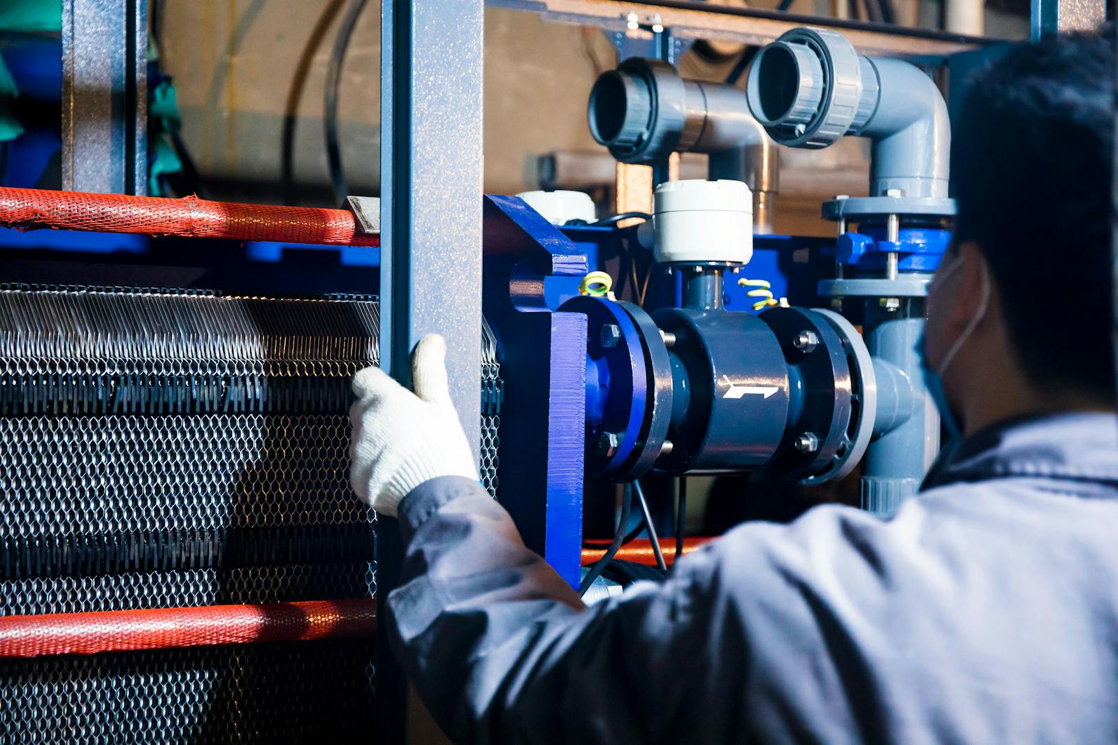 Technician working safely on cryogenic process equipment